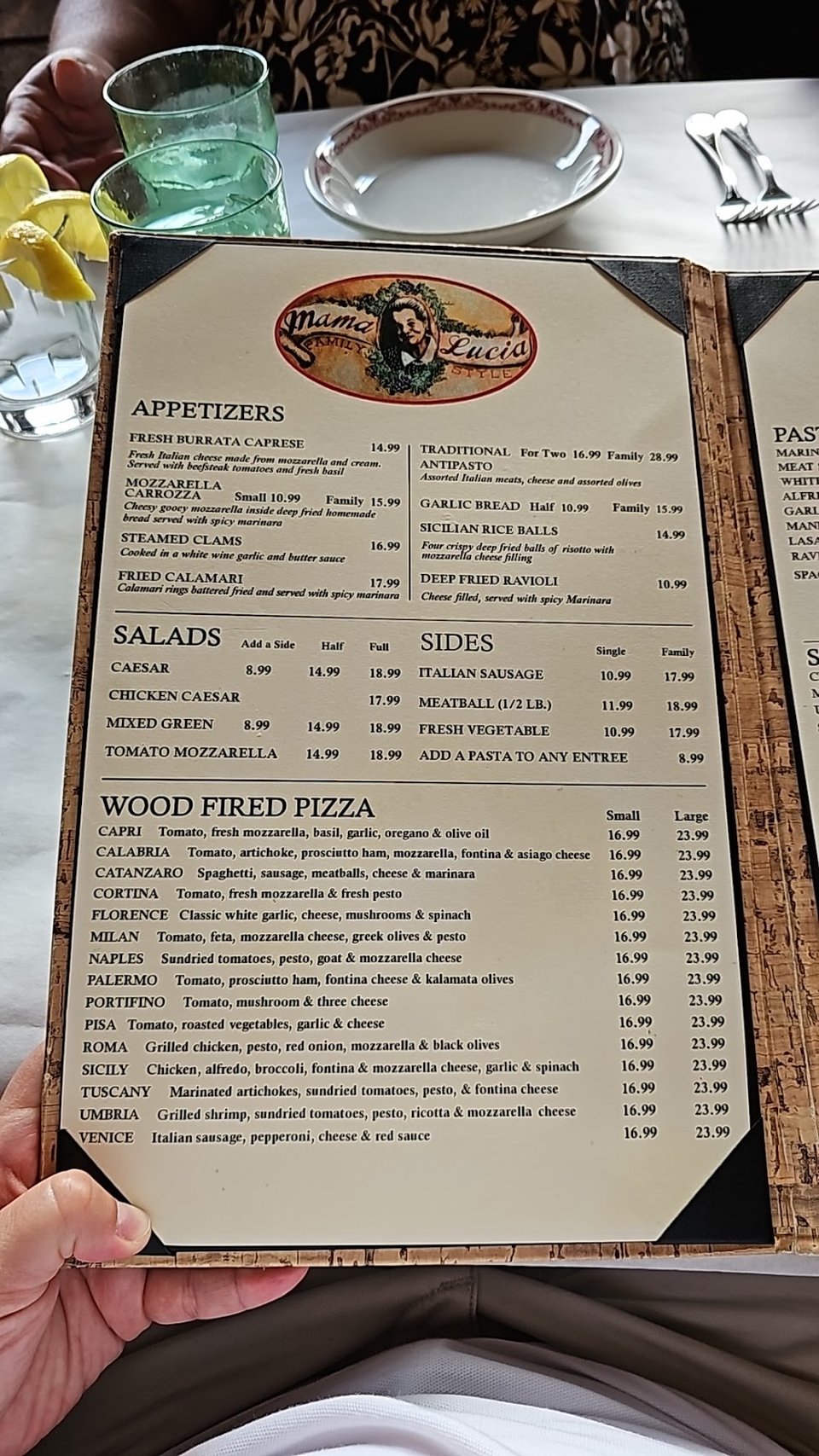 Menu page showing pizza, pasta, and seafood.